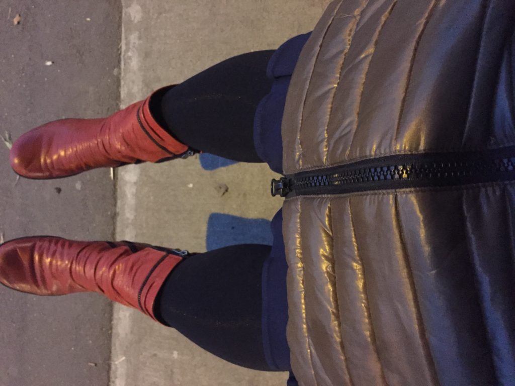 Black legs red boots sleeping bag coat