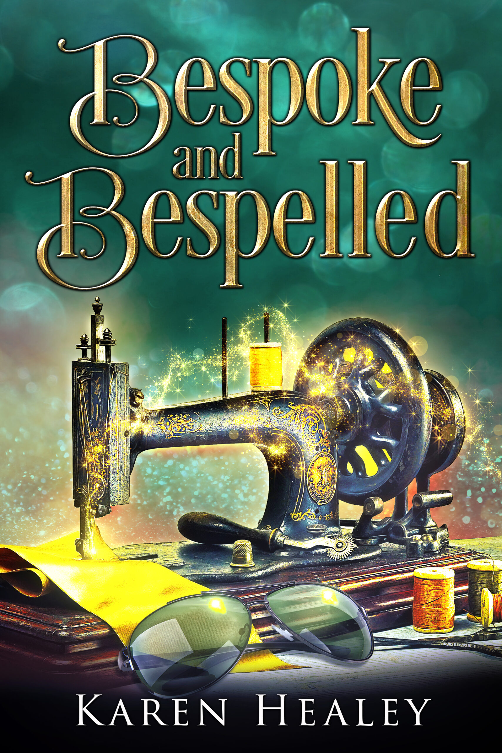 Karen Healey - Bespoke and Bespelled An old-fashioned treadle sewing machine against a green background is festooned with golden trails of magic. Sitting in front of it are a pair of obnoxiously large sunglasses. Golden curlicue lettering reads: "Bespoke and Bespelled"