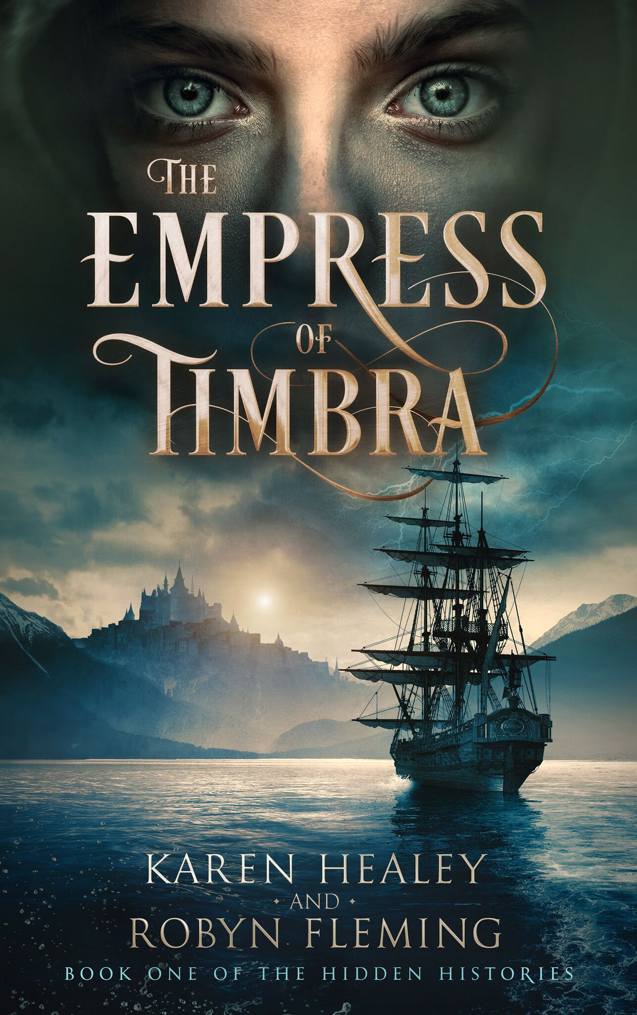 A three-masted sailing ship is nearing a mountainous bay. The sun is rising or setting over a mountain-top palace. Above the gold-lettered title "The Empress of Timbra"m we see a pale young face with blue eyes staring at the reader.